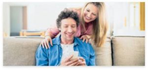 Old Married Couples Smiling While Watching on their Phone