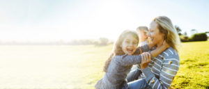 Family Outing on a Field with her Daughter