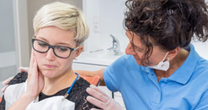 The Dentist Comforting her Patient