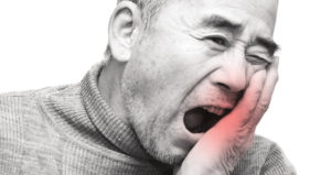 An Old Man Suffering from Tooth Pain